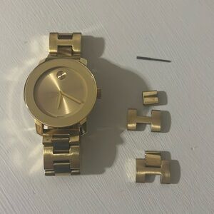 Gold women’s Movado watch